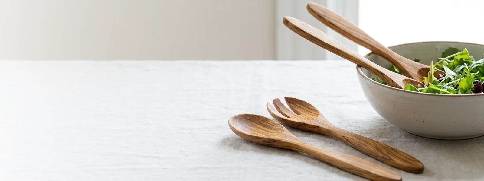 One Olive Trunk, Two Servers, Cut So They Will Not Scratch the Bowl